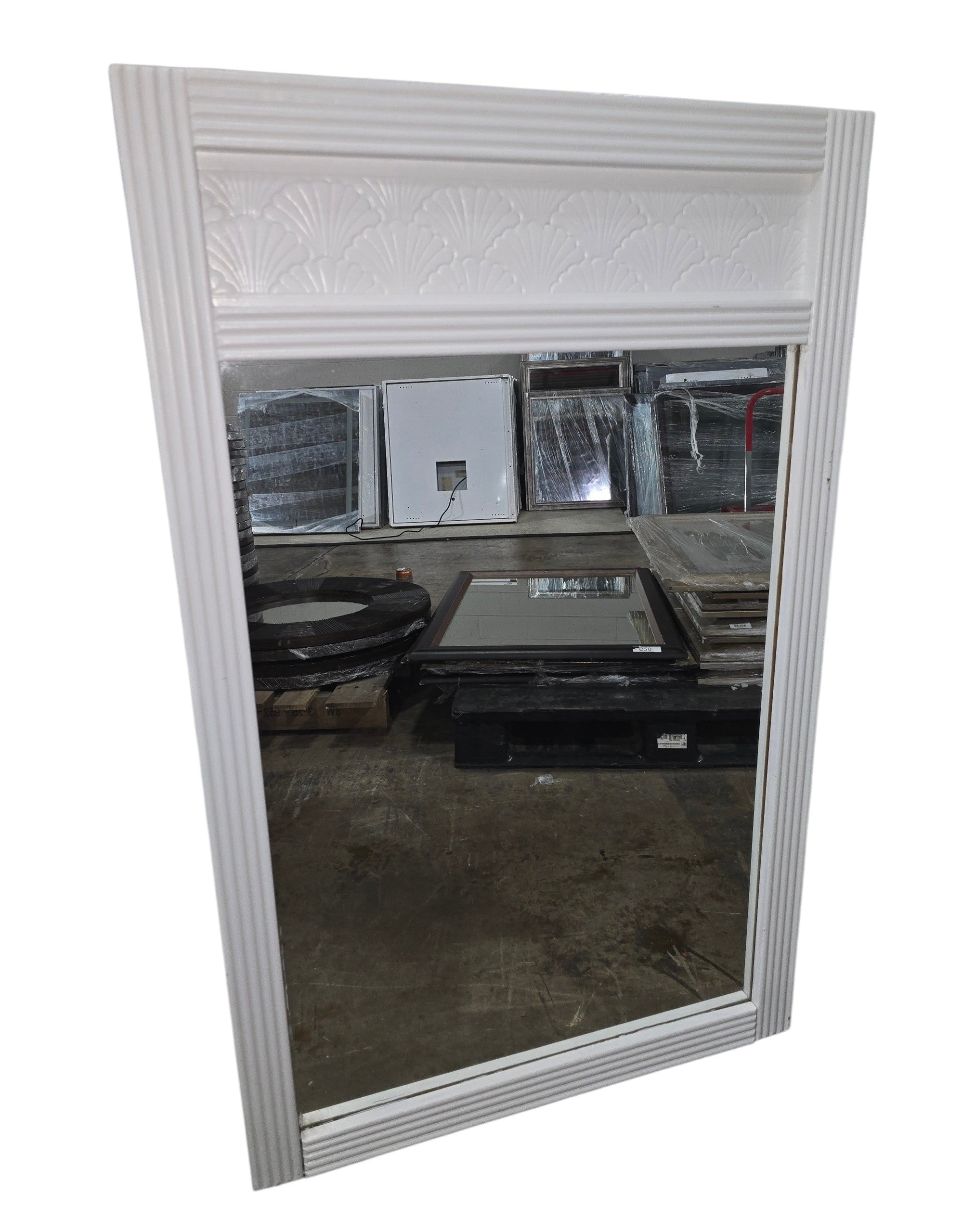 Coastal white shell motif wall mirror measuring 27.5 x 44 inches