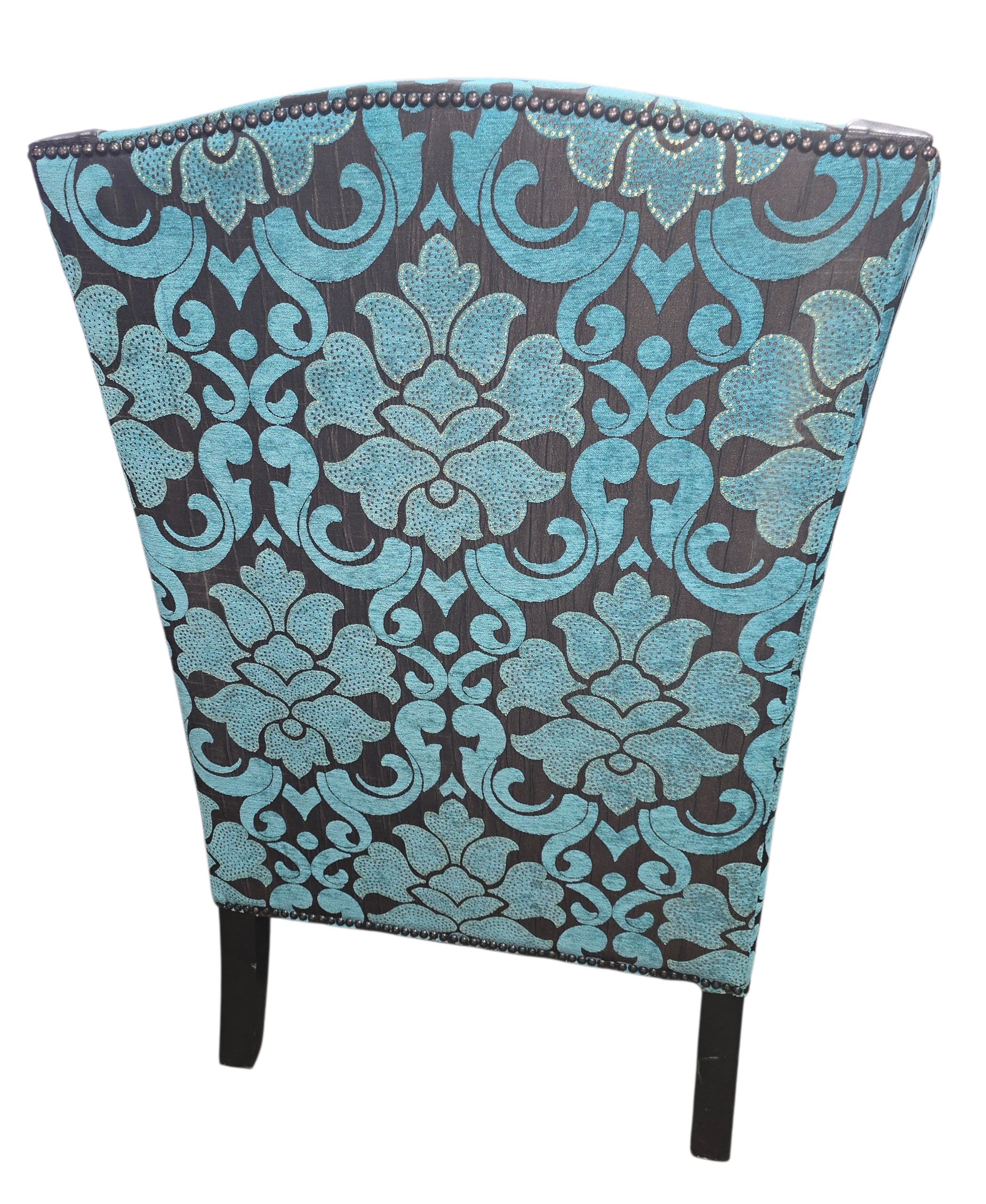 Close-up of damask upholstery detail on chair back
