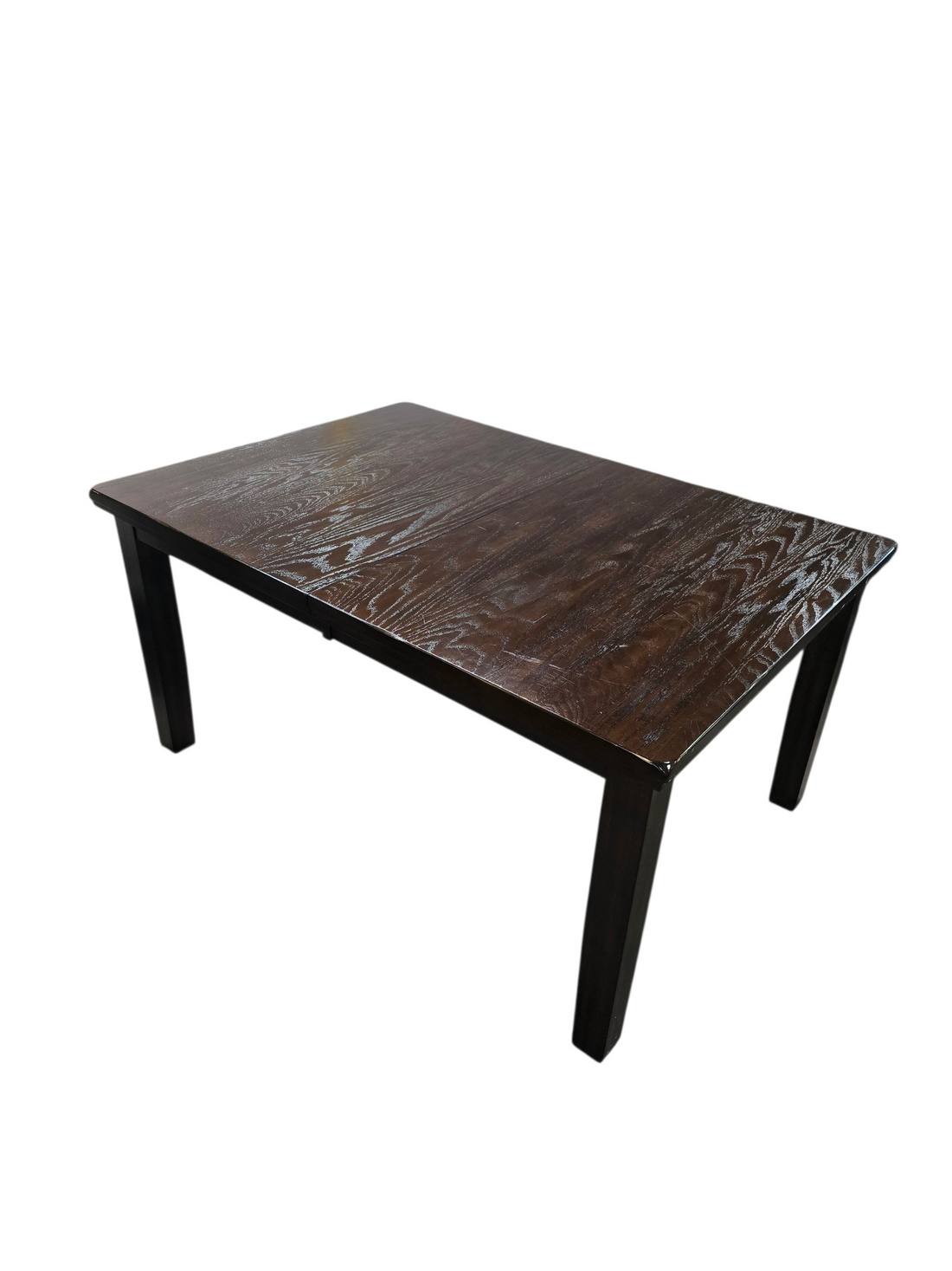 Dark wood table surface with visible grain detail