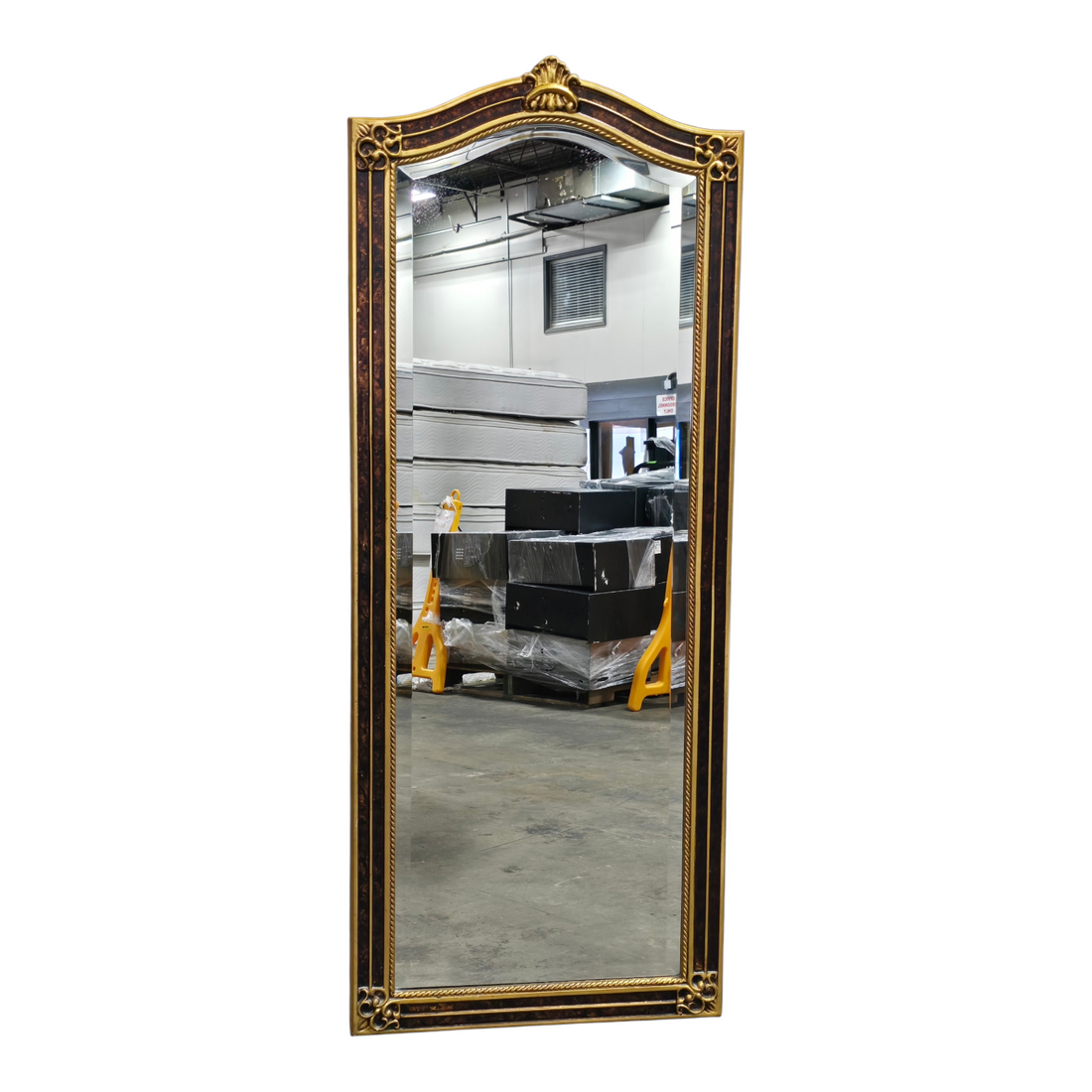 Floor mirror with dark brown and gold colored frame measuring 24 x 60, used and in good condition