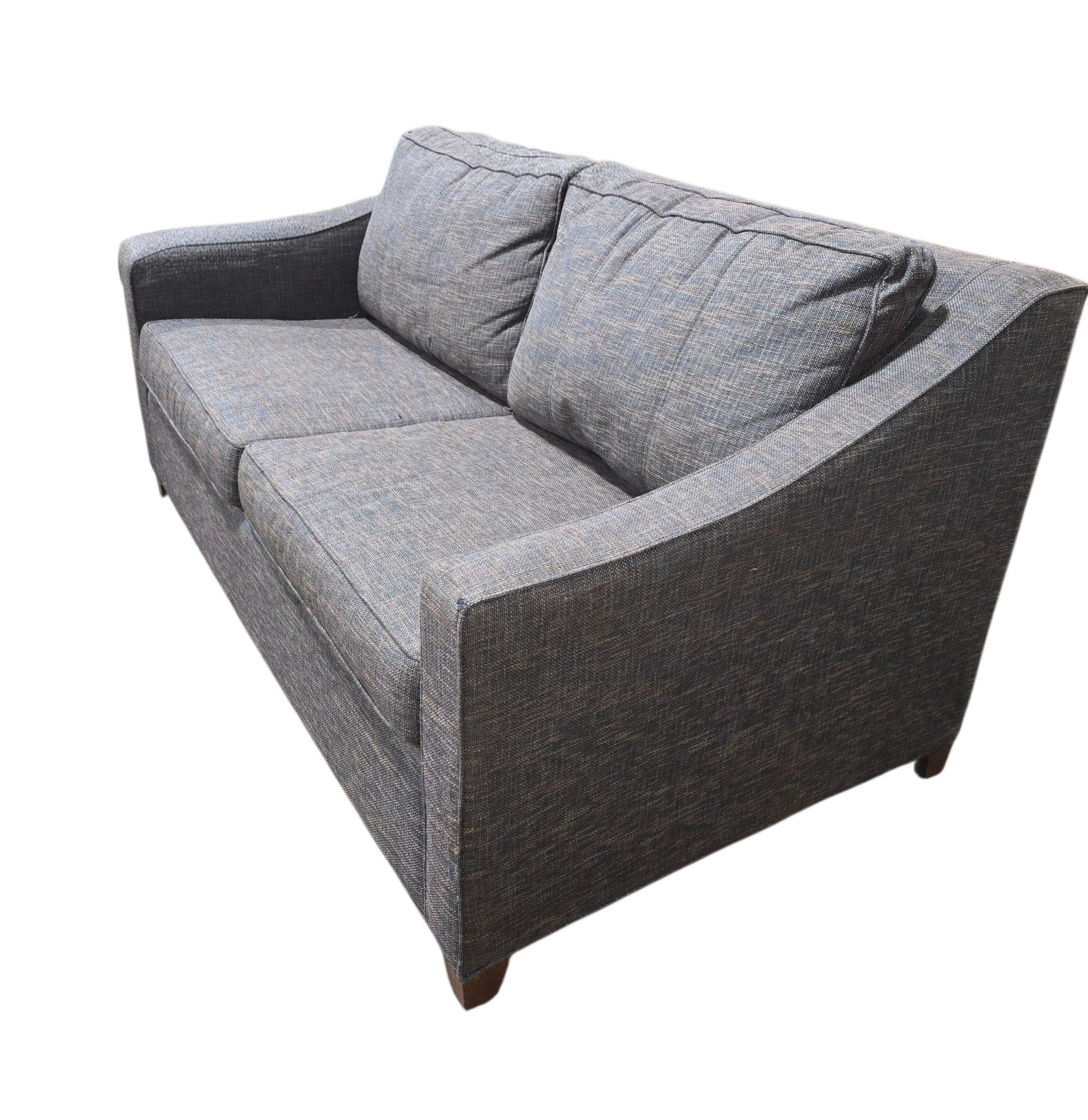 Angled view of gray textured queen sofa sleeper with modern curved arms and wood legs