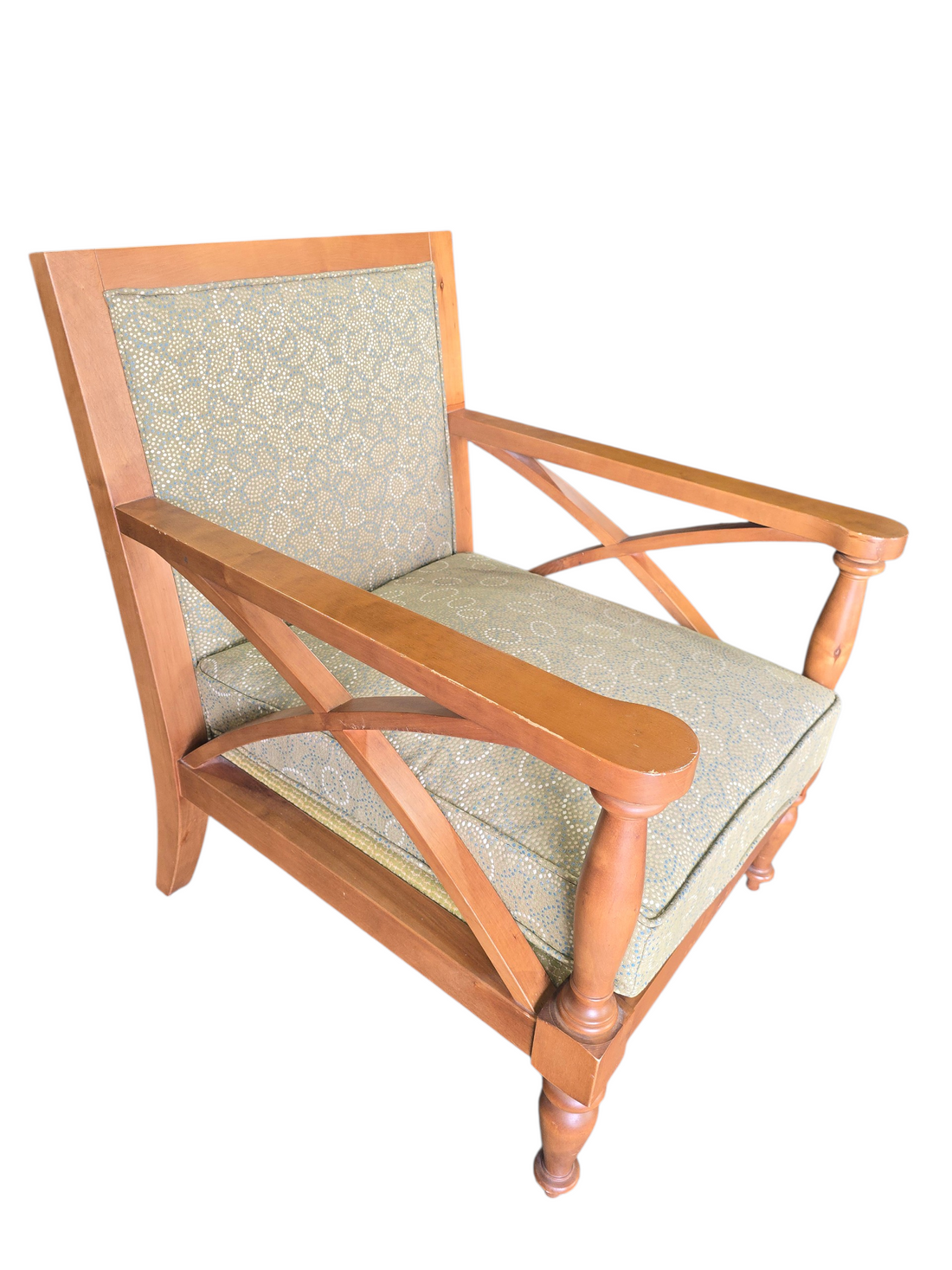 Side angle view of armchair showing lattice design