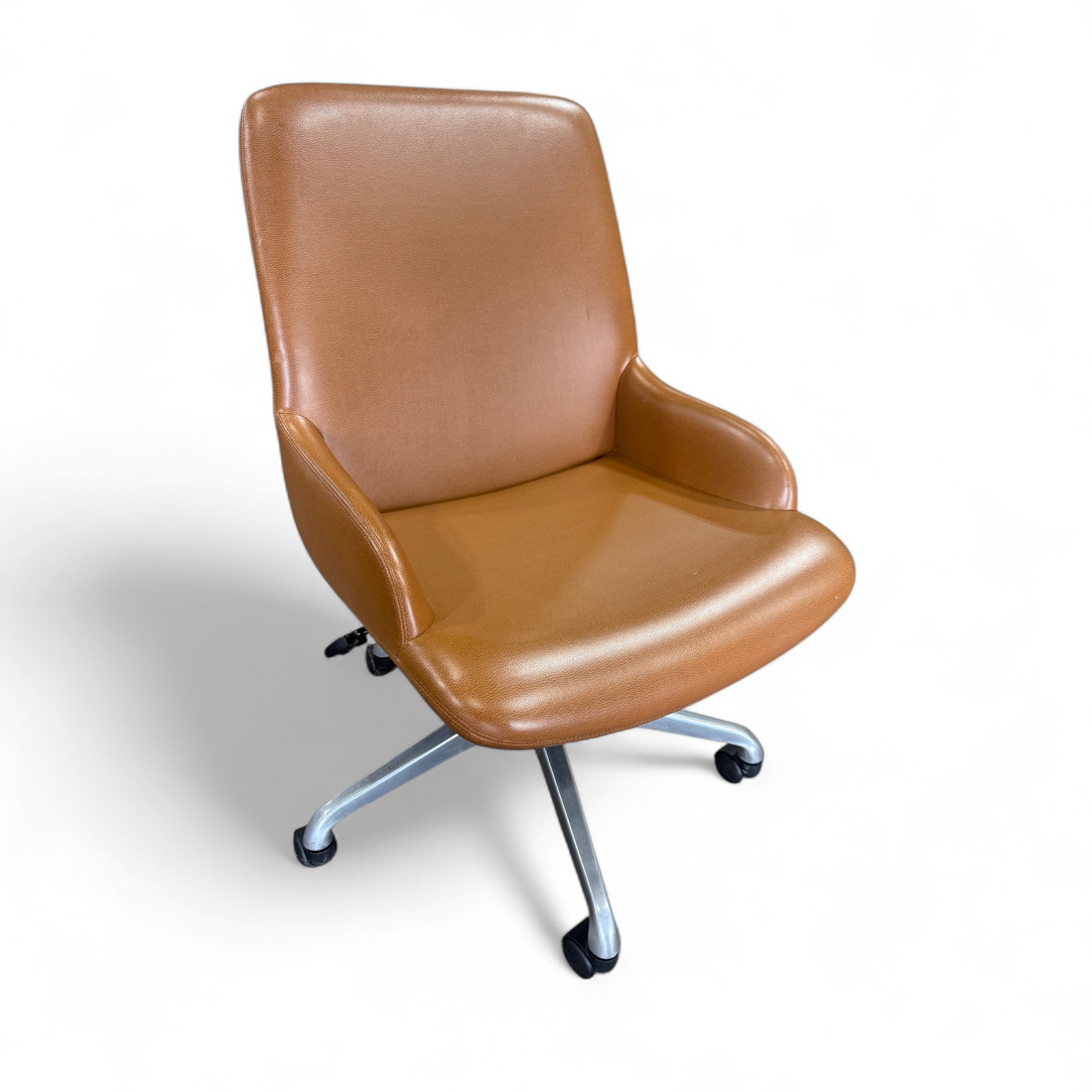 SHL side view of light brown vinyl rolling office chair showing armrests, used and in good condition