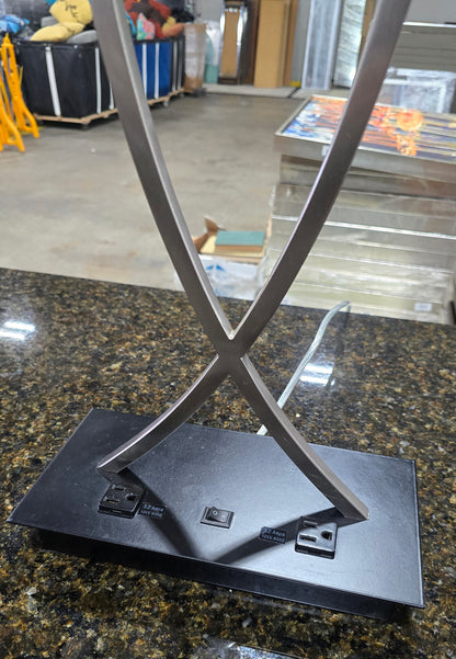 SHL close-up of base with two power outlets on metal criss-cross lamp