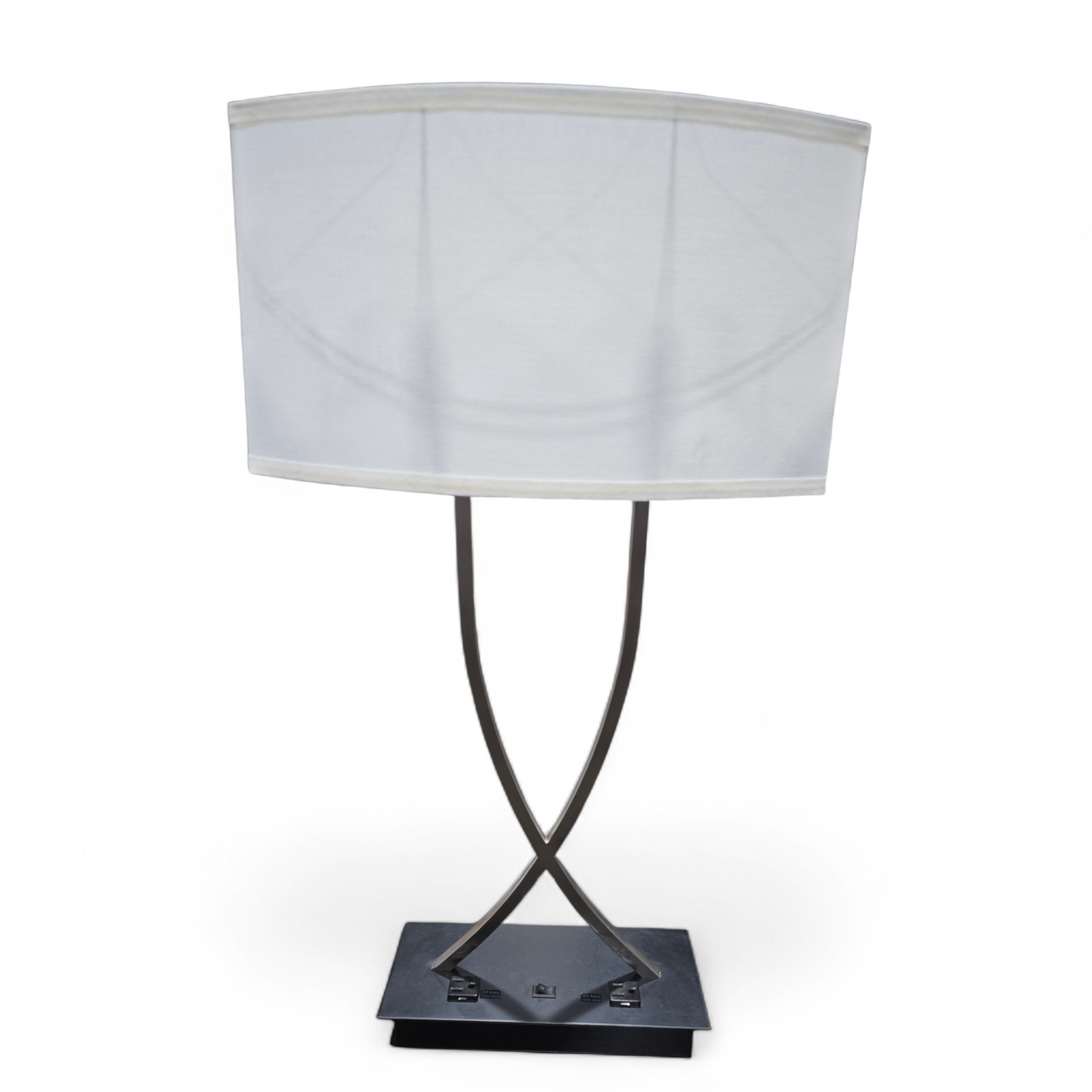 SHL front view of metal criss-cross table lamp with built-in power outlets, used and in good condition