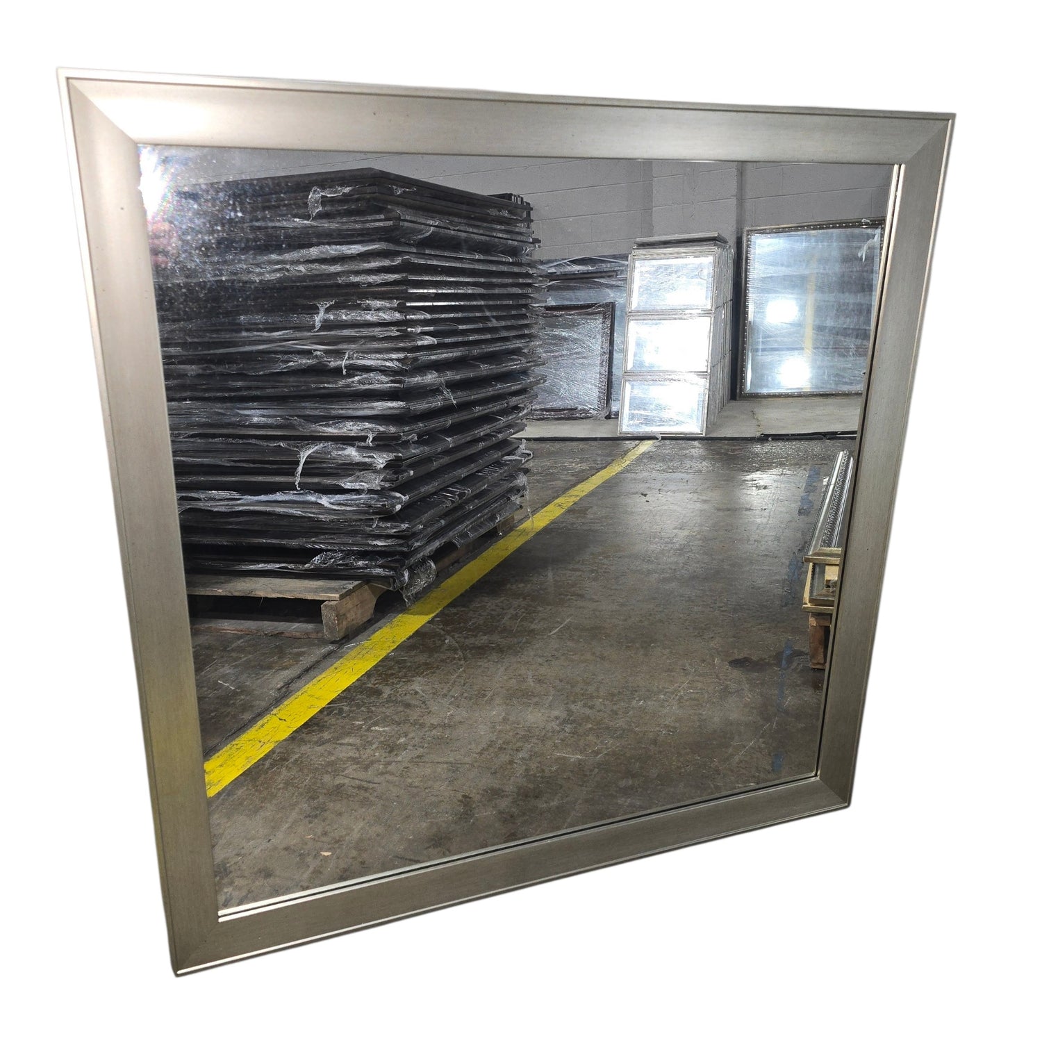 Metallic framed square wall mirror measuring 38.5 x 38.5 with contemporary styling
