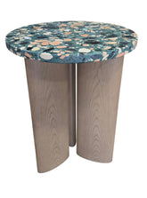 Modern terrazzo accent table with colorful stone composite top and natural wood pedestal base measuring 21 inches round