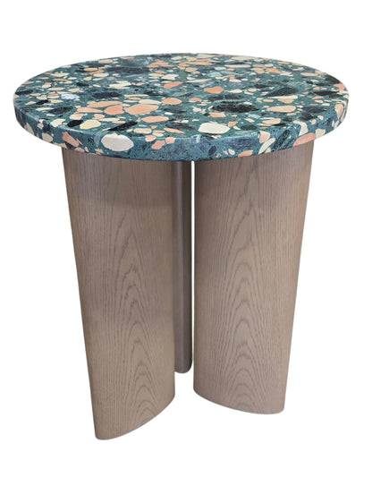 Modern terrazzo accent table with colorful stone composite top and natural wood pedestal base measuring 21 inches round