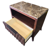 Side angle view of granite top nightstand with open storage