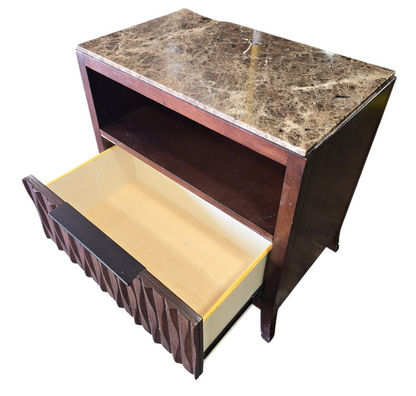 Side angle view of granite top nightstand with open storage