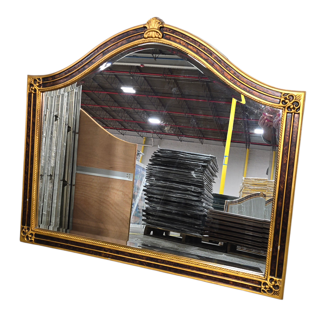 Close up of gold frame detail with decorative corner elements