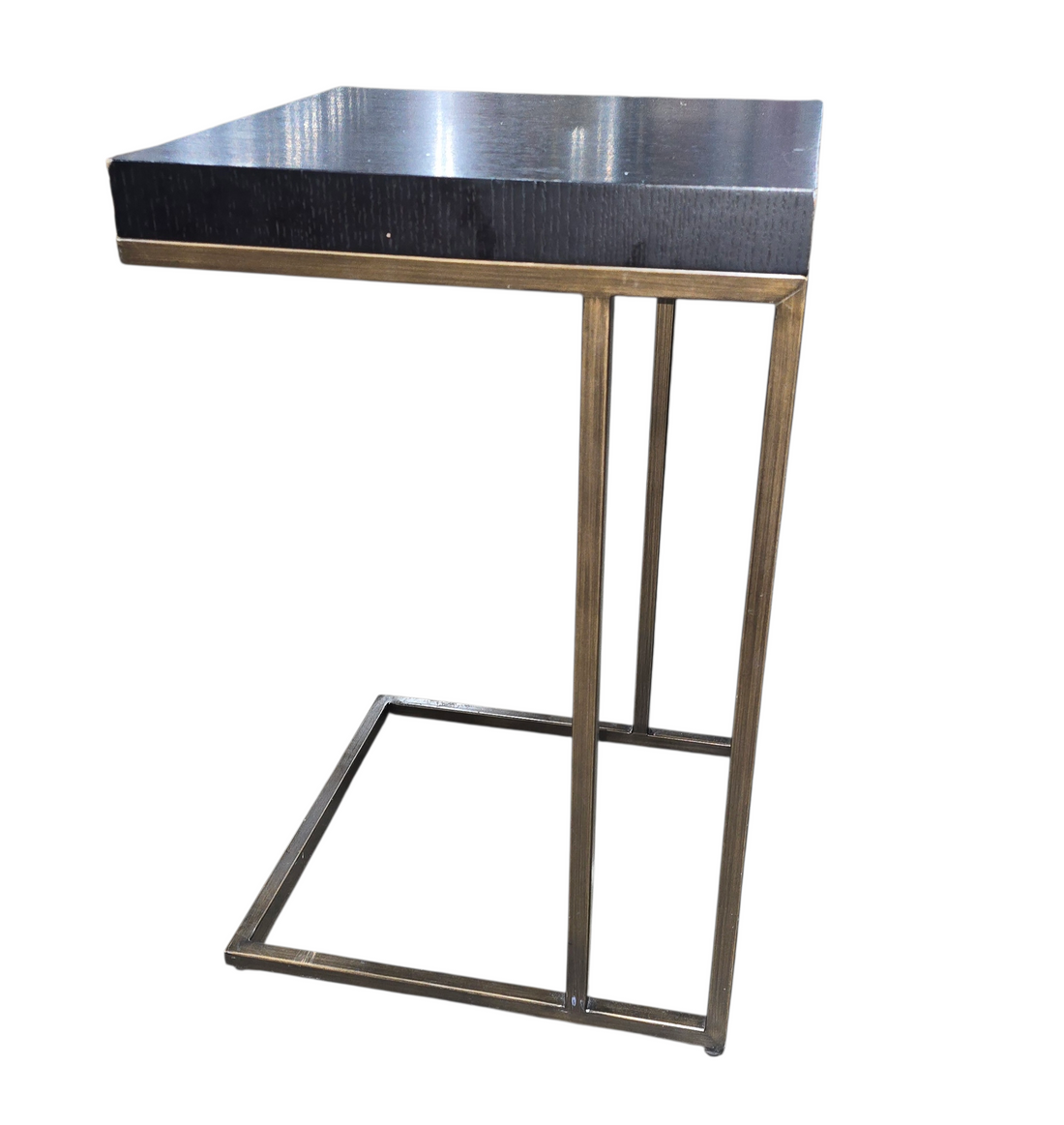 Over-arm sofa table with metal legs and dark brown top, used and in good condition