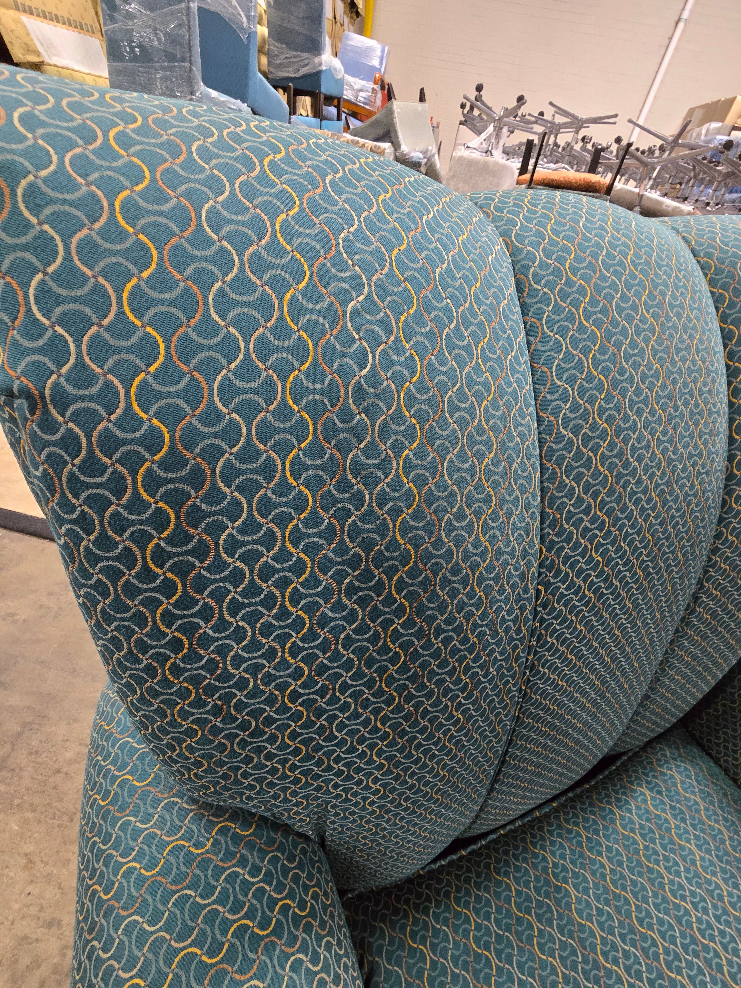 Accent chair with wooden legs and patterned upholstery