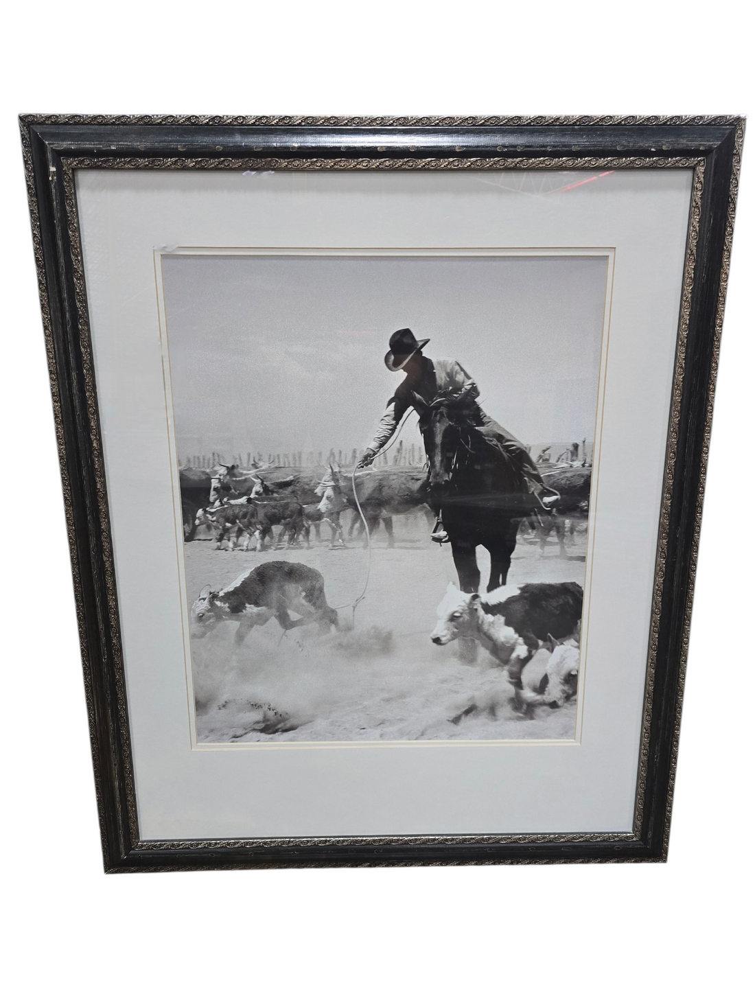Framed black and white photograph titled Roper at Bell Ranch measuring 29 x 35, used and in good condition