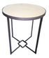 Front view of round accent table with cream granite surface