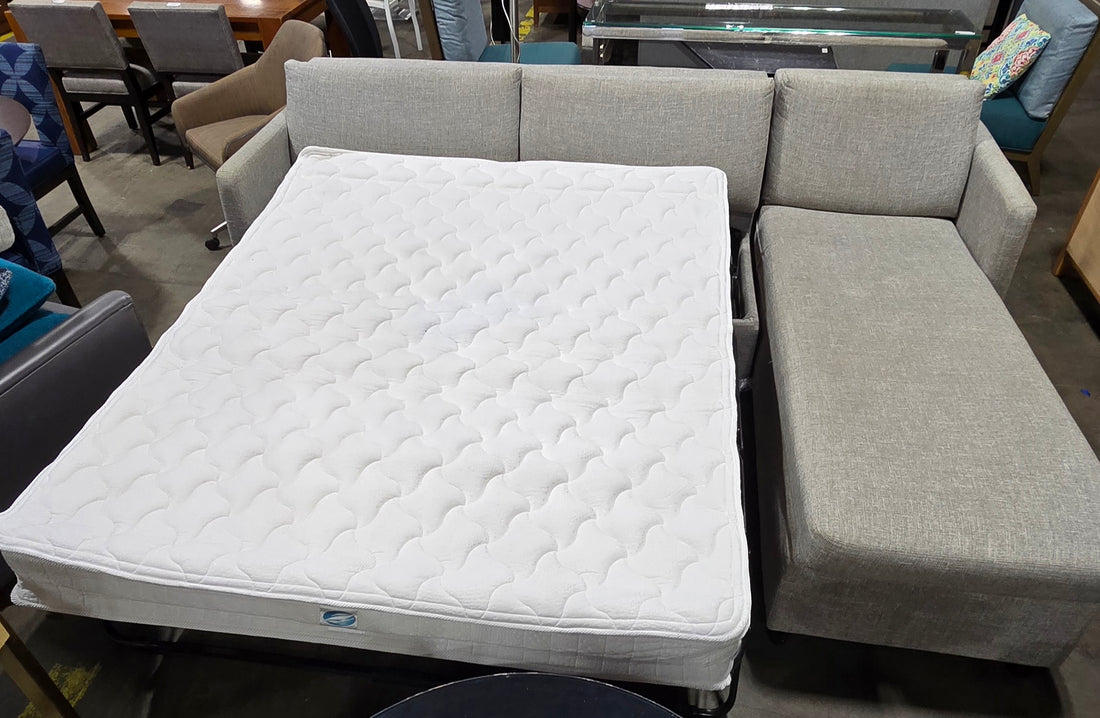 SHL open view of full-size pull-out bed in sectional sleeper sofa