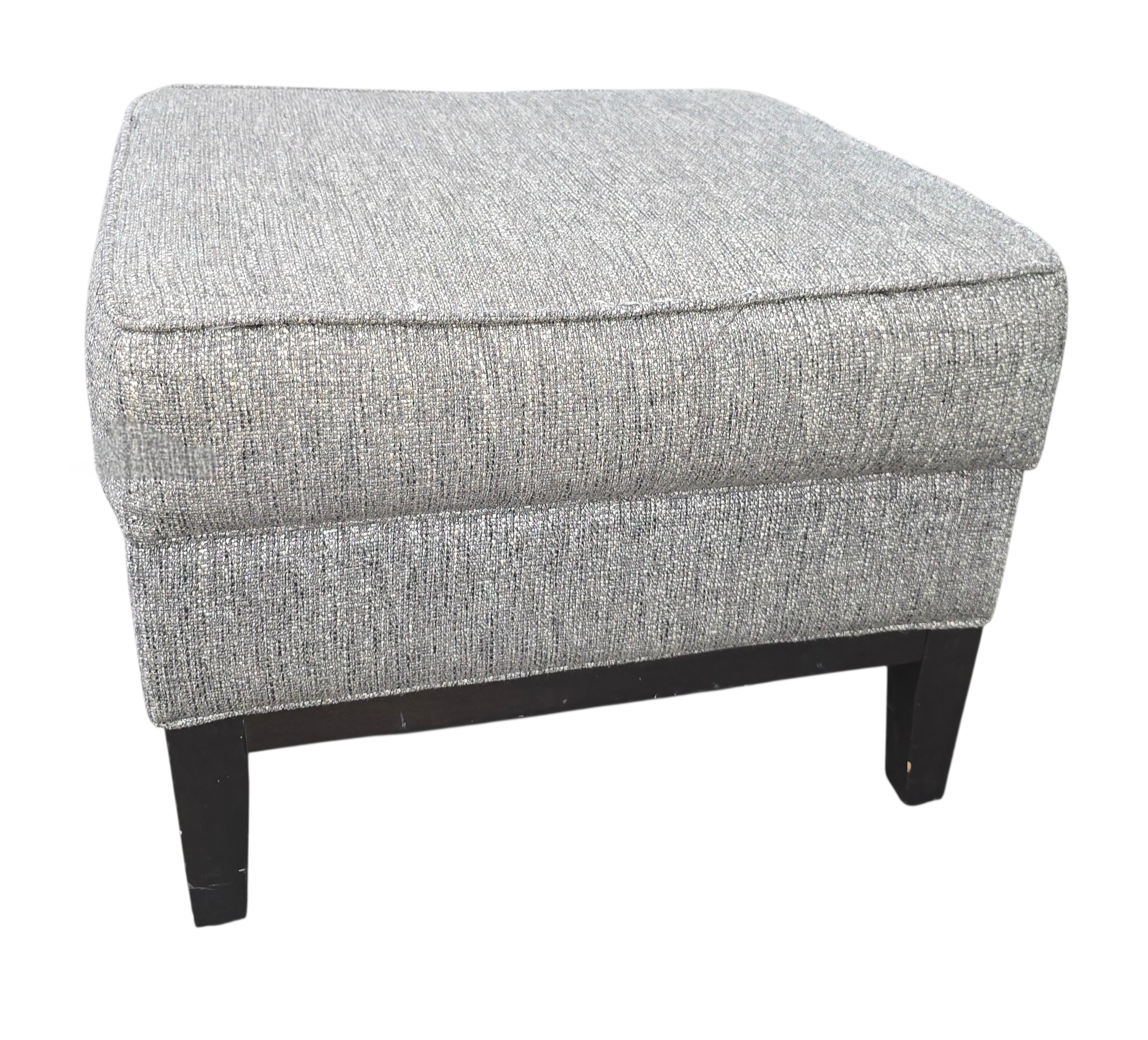 Small gray fabric footstool in good condition