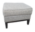 Small gray fabric footstool in good condition