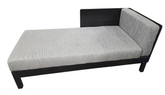 Solid wood chaise lounge with built-in cushions measuring 66 x 30 x 17, used and in good condition