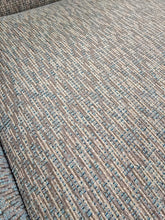 Close-up of textured fabric upholstery detail