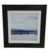 Framed print of trestle over a body of water, used and in good condition