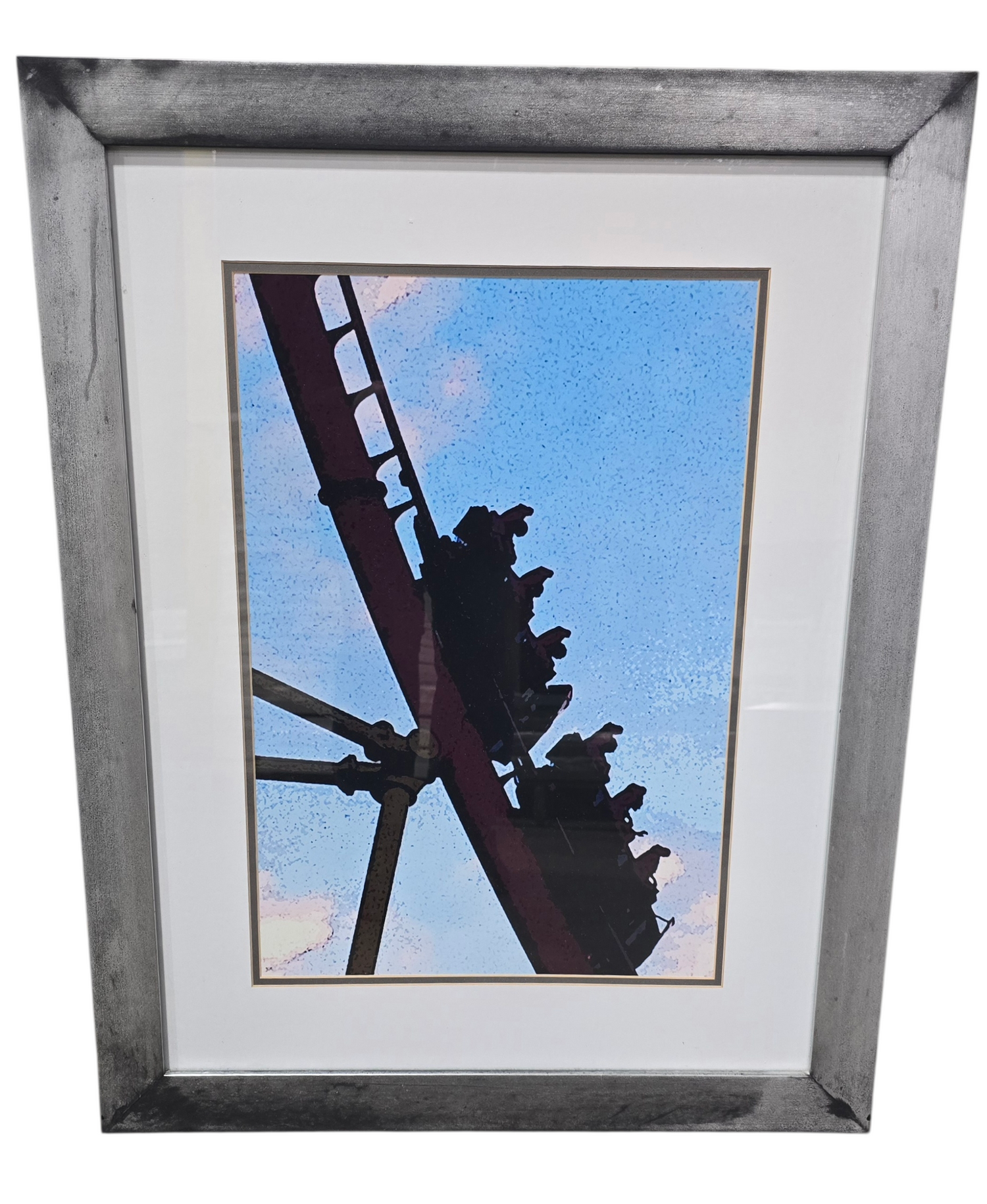 Framed picture of people on a roller coaster at Universal Studios, used and in good condition