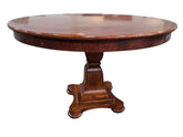 SHL side view of quality used 48 inch round wood pedestal dining table featuring a solid traditional pedestal base and cherry wood finish sourced from an upscale resort