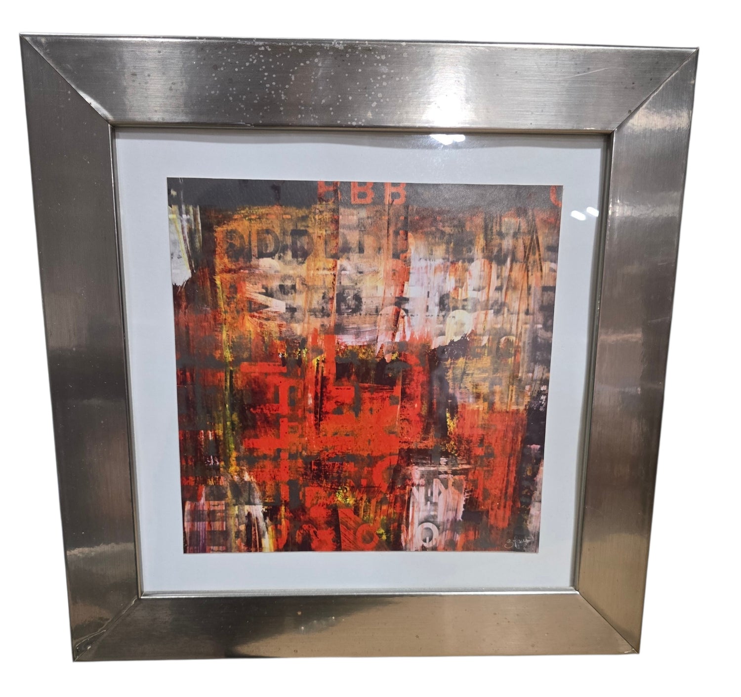 SHL used abstract framed wall art print featuring red, black, gold, and neutral tones with white matting and a brushed silver-tone frame measuring 16 inches by 16 inches.
