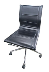 Used black faux leather rolling office chair with chrome base sourced from an upscale resort