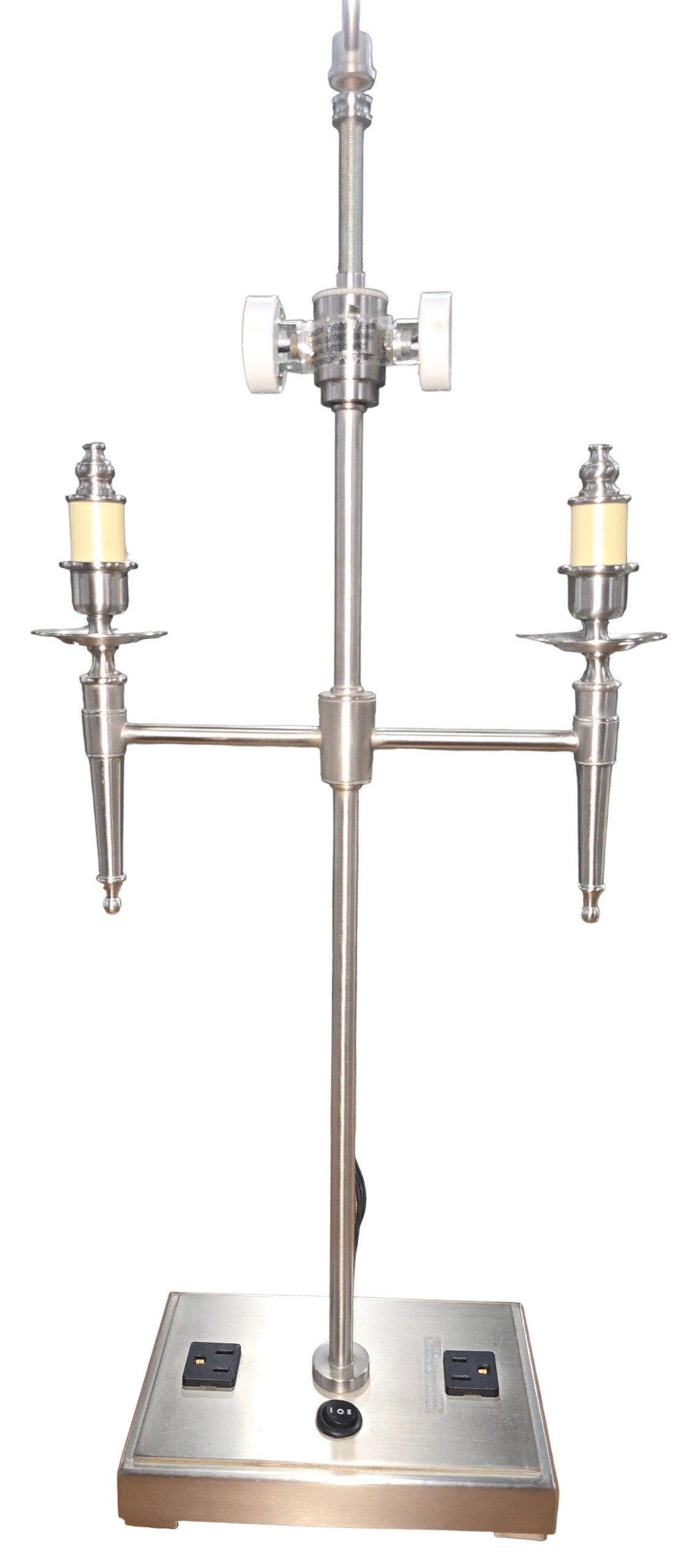 SHL close-up of brushed nickel table lamp base featuring two built-in 120V power outlets and power switch sourced from an upscale resort