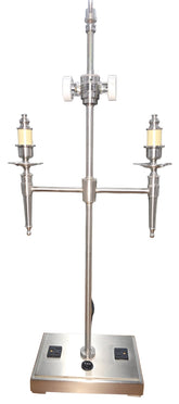 SHL close-up of brushed nickel table lamp base featuring two built-in 120V power outlets and power switch sourced from an upscale resort