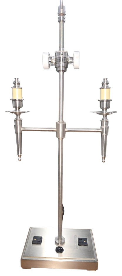 SHL close-up of brushed nickel table lamp base featuring two built-in 120V power outlets and power switch sourced from an upscale resort
