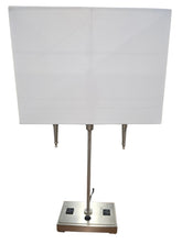 SHL quality used brushed nickel two-light table lamp with white rectangular shade and dual built-in power outlets sourced from an upscale resort