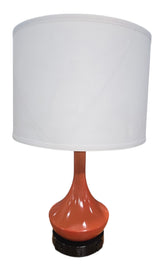 SHL quality used coral ceramic table lamp with white drum shade and dual built-in power outlets sourced from an upscale resort