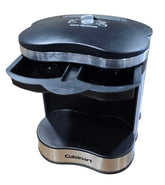Close-up of a used Cuisinart two cup coffee maker with the dual pod holder open, showing its resort-quality design for brewing one or two 8-ounce cups. Available at Southern Hospitality Liquidation in Cartersville, GA near Atlanta, Marietta, Kennesaw, and Rome.