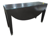 SHL used dark espresso entryway console table featuring glass top and metal-capped legs sourced from an upscale resort
