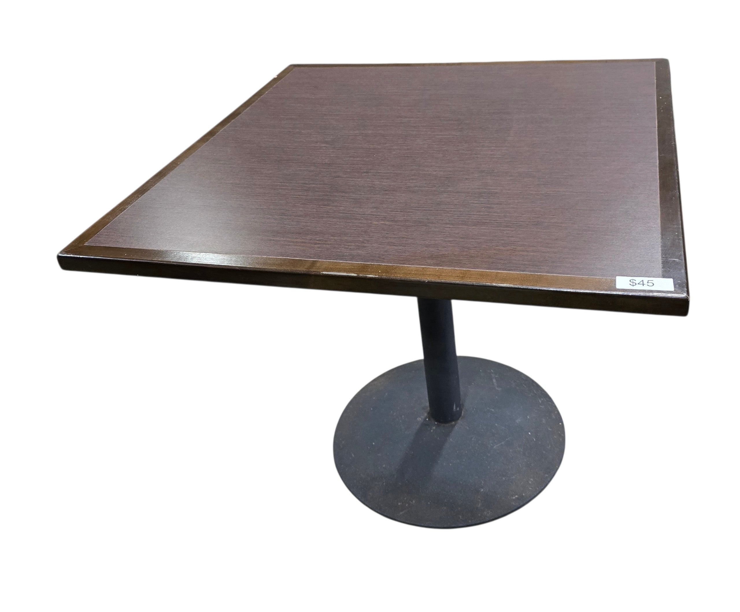 Quality used resort dining table with dark wood square top and black pedestal base