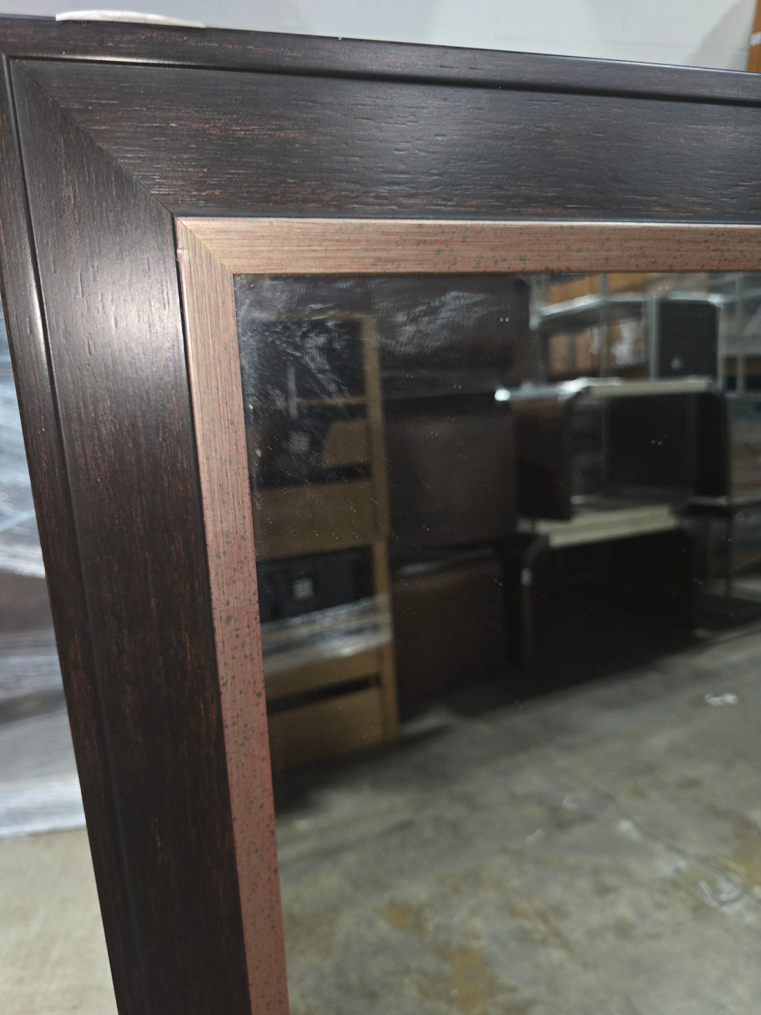 Used large wall mirror in good condition with copper trim 47.5 x 63.5