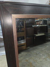 Used large wall mirror in good condition with copper trim 47.5 x 63.5