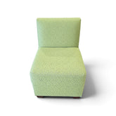 Used lime green patterned armless accent chair front view SHL