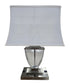 SHL quality used modern brushed nickel table lamp with clear acrylic accent, white rectangular shade, and dual built-in power outlets sourced from an upscale resort