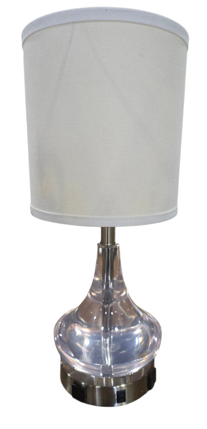 SHL quality used modern clear acrylic table lamp with white drum shade and dual built-in power outlets sourced from an upscale resort