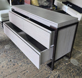 Used Montague 4 drawer gray wood dresser with soft close drawers, showing side view detail, sourced from an upscale resort by Southern Hospitality Liquidation in Cartersville, GA near Atlanta, Marietta, Kennesaw, and Rome.
