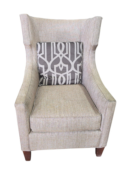 SHL used neutral beige wingback accent chair with gray geometric accent pillow sourced from upscale resort