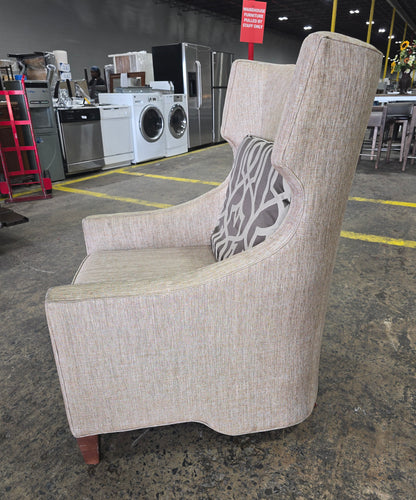 SHL used neutral beige wingback accent chair side profile showing wingback design and curved arms