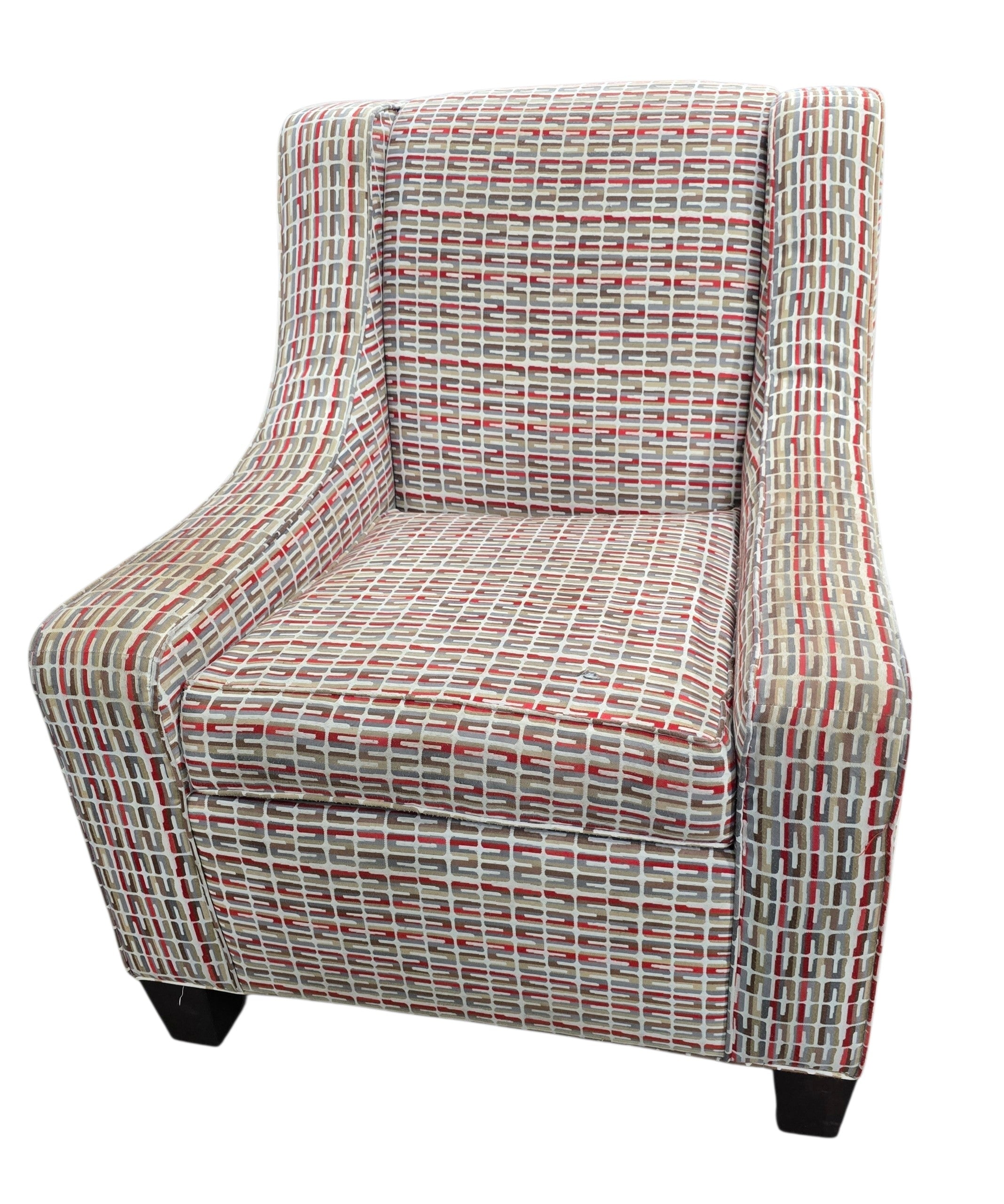 Used wingback accent chair with geometric patterned upholstery sourced from an upscale resort