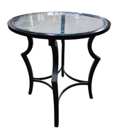 SHL used round glass top accent table with decorative black metal base sourced from an upscale resort