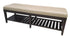 Quality used upholstered storage bench with a cream cushion and dark wood frame featuring a slatted lower shelf, sourced from an upscale resort. Available at Southern Hospitality Liquidation in Cartersville, GA.