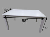 “White wood dining table, used resort furniture from Grand Palms Resort, 58 x 36 x 30”