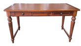 SHL used traditional wood writing desk with pull-out keyboard tray sourced from an upscale resort